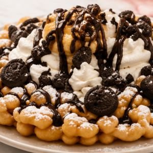 Chocolate lover funnel cake with chocolate drizzle and chips